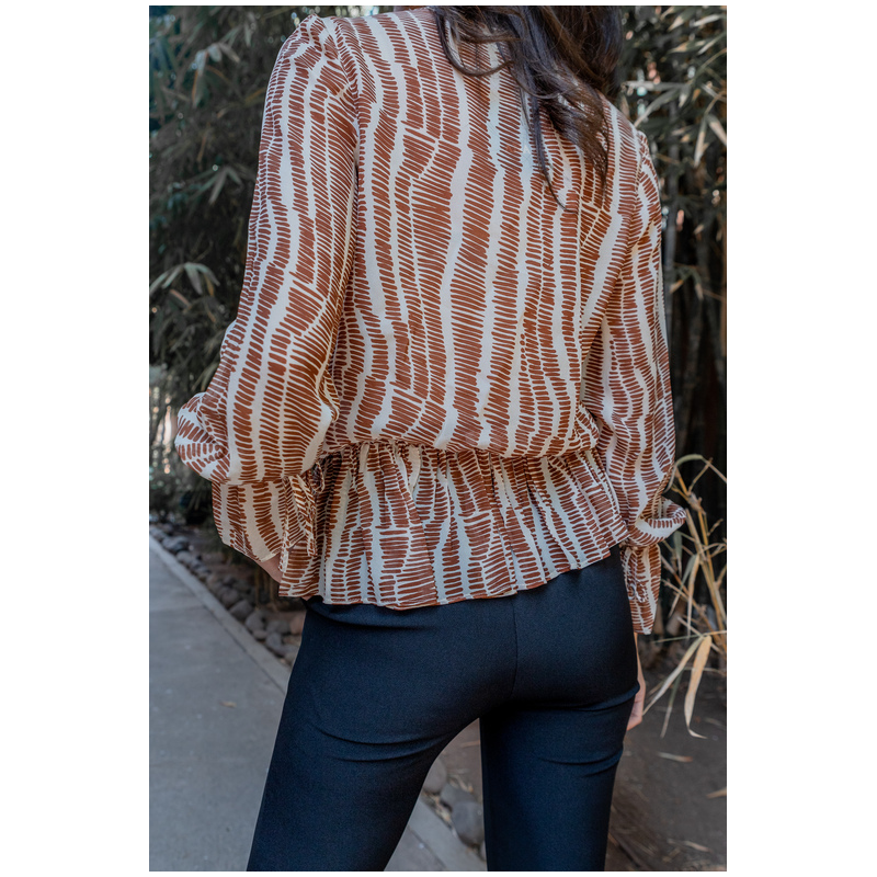 le dos de Blouse blanche à rayures marron