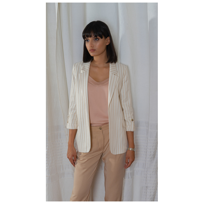 Blouse blanche avec des lignes marron clair
