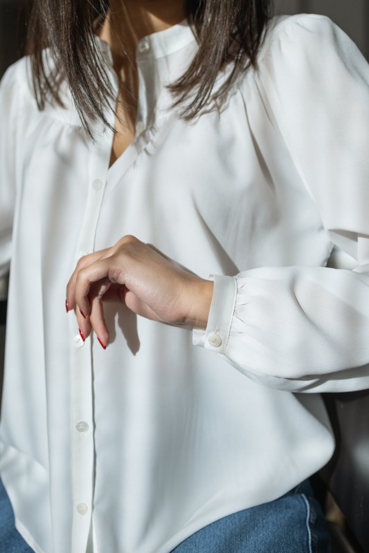 Détails de la blouse blanche