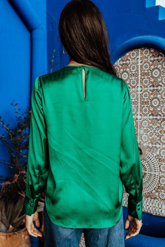 Blouse verte décontractée pour femme pour un usage quotidien.