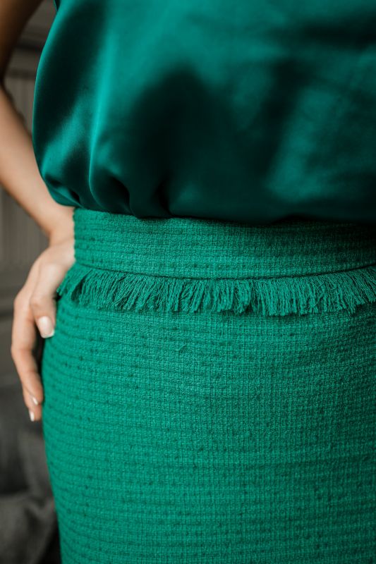 Détails de la jupe : Couleur verte et style naturel.