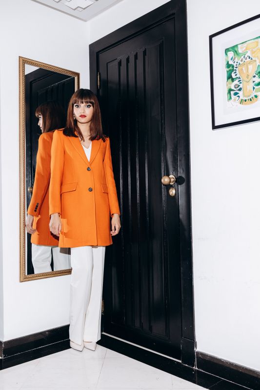 Manteau tweed long AMSTERDAM en orange, style contemporain avec deux boutons.