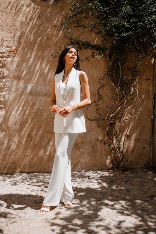 Pantalon blanc élégant pour dames, pour un look raffiné.