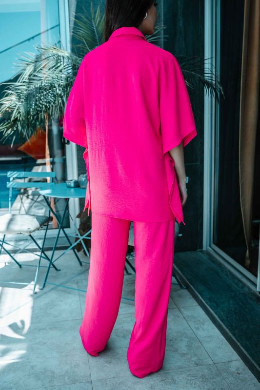 Chemise rose à manches courtes pour femme : Parfaite pour l'été.