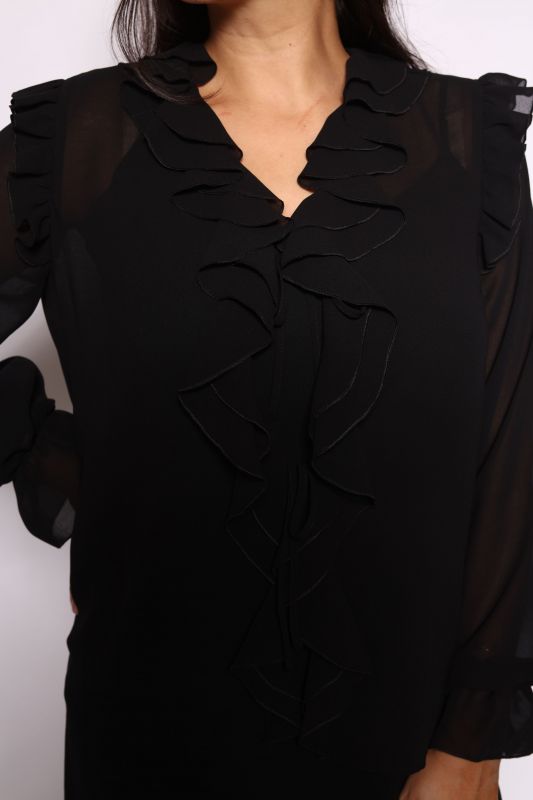 Détails de la chemise : Couleur noire et design tendance.