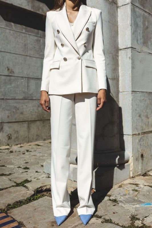 Veste blanche ERWIN de la Checks Collection, élégance moderne avec un design double boutonnage.