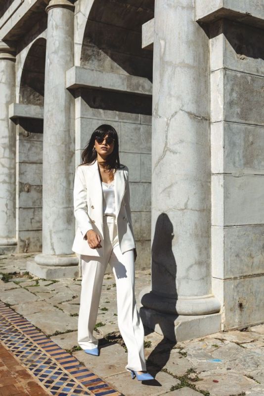 PANTALON ERWIN pour femme de la collection Checks en blanc, élégance discrète pour un style sophistiqué.