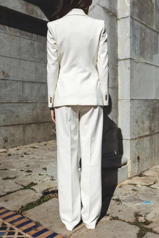 Pantalon à carreaux ERWIN en blanc, un classique revisité pour une garde-robe moderne et élégante.